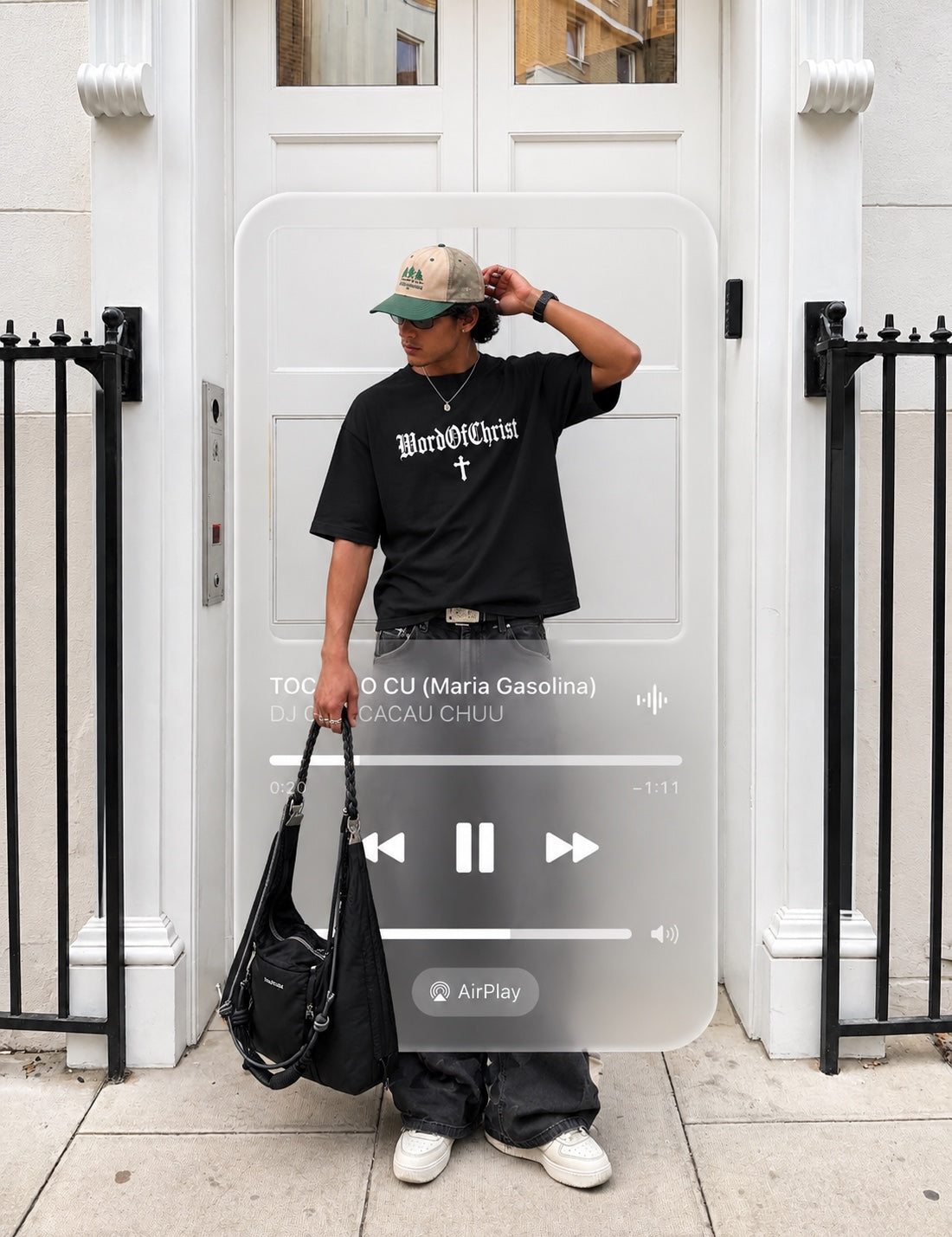 Model in a black WordOfChrist tee with a music-player artwork overlay